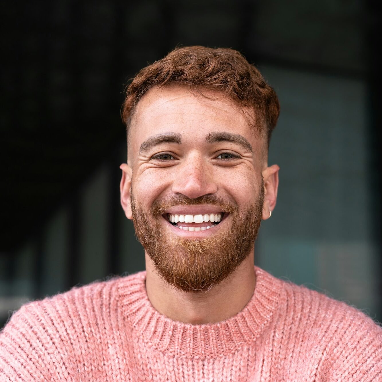 Portrait of happy man smiling in camera